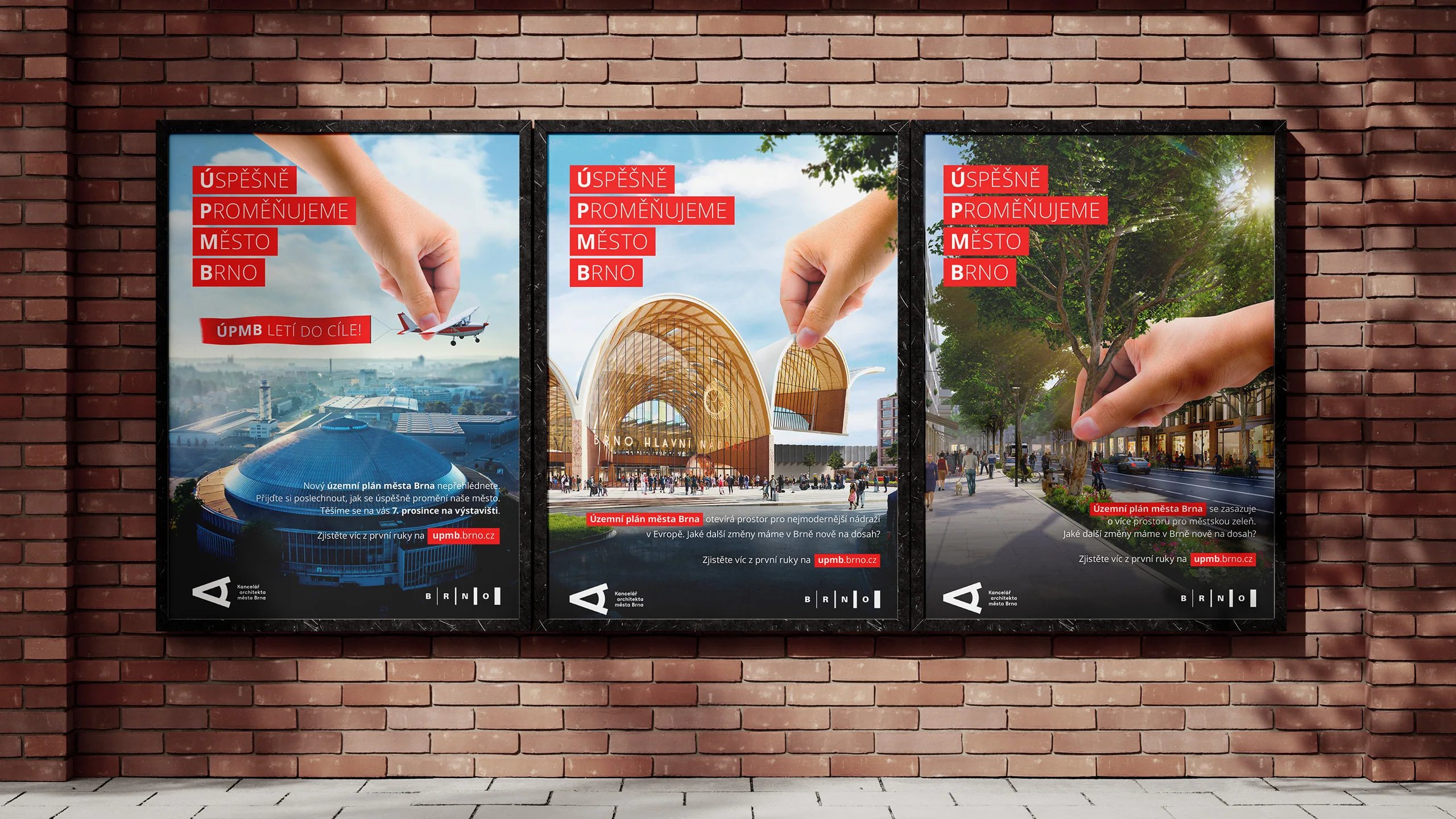 Brick wall with three digital city plan posters